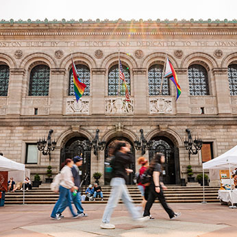 People walking outside the library. Links to Gifts by Estate Note