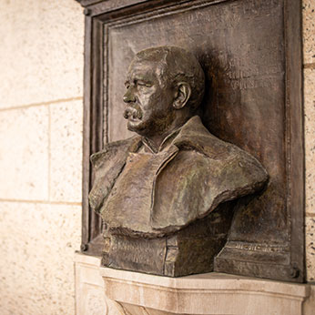 A bust of a man. Links to Tangible Personal Property